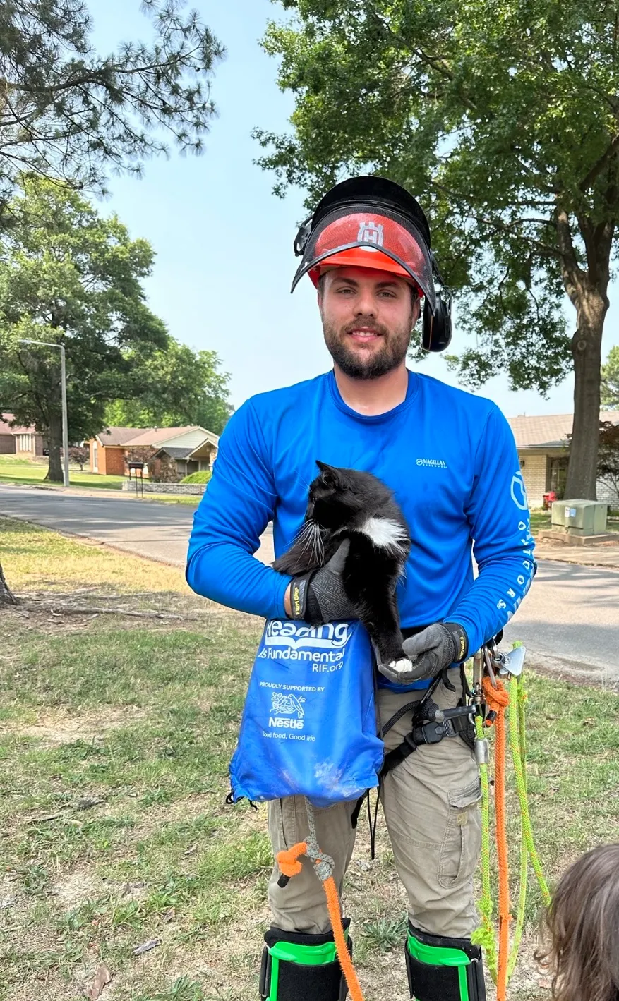 Greencare Property Services expert with a cat
